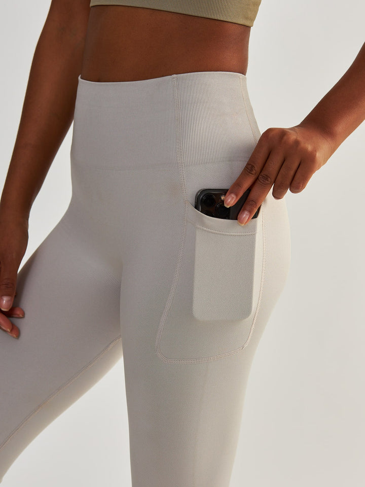 Kompresyjne Jasnoszare Legginsy z Kieszeniami - Lift Me Up